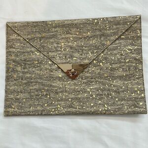 Gold trim envelope style clutch